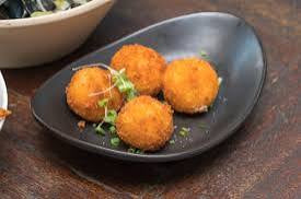 Poultry Cromesquis ( meat ball ) with asparagus and safran